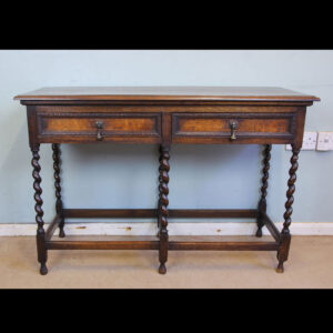 Antique Oak Barley Twist Two Drawer Side Table. This oak side table has a solid oak top with moulded edge under having two drawers