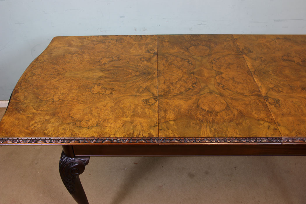 Extending Dining Burr Walnut Table.