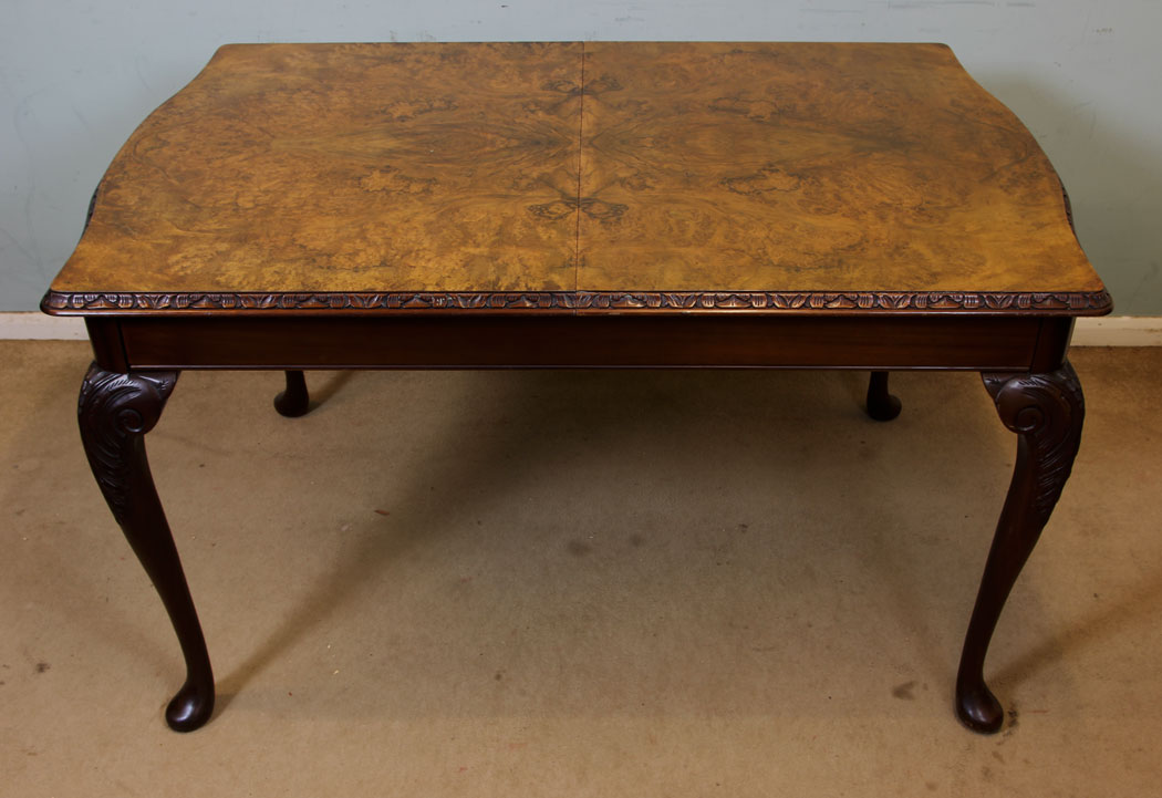Queen Anne Style Burr Walnut Extending Dining Table.