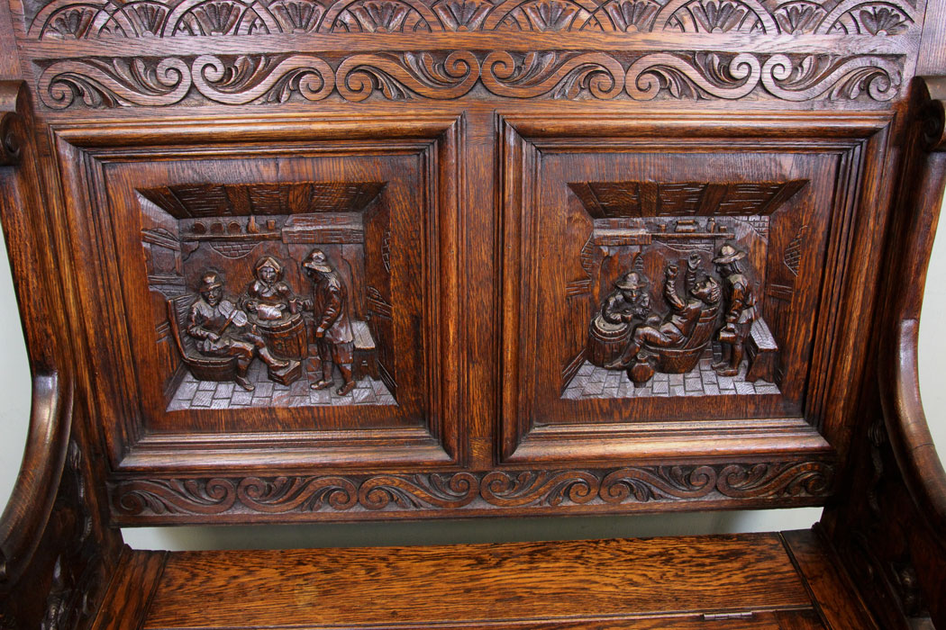 Antique Oak Settle. Carved Tavern Scene,