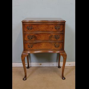 Small Shaped Figured Walnut Chest of Drawers.