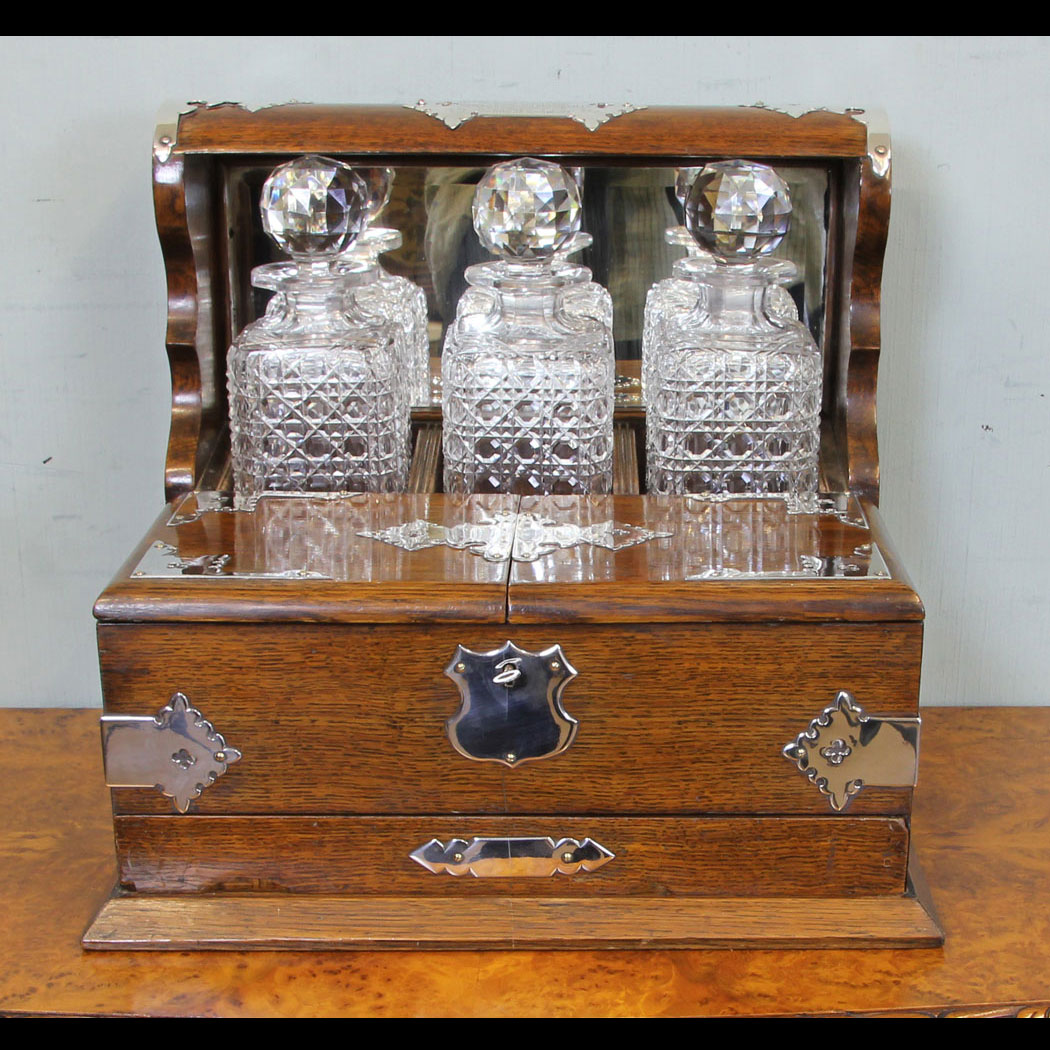 Antique Tantalus, Antique Oak Case Three Bottle Tantalus