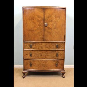 Figured Walnut Bow Fronted Tallboy Cupboard