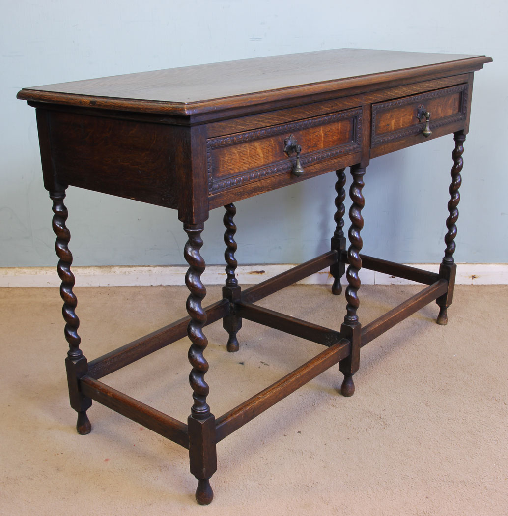 11376r2 Antique Oak Side Table, Antique Oak Barley Twist Two Drawer Side Table. This oak side table has a solid oak top with moulded edge under having two drawers