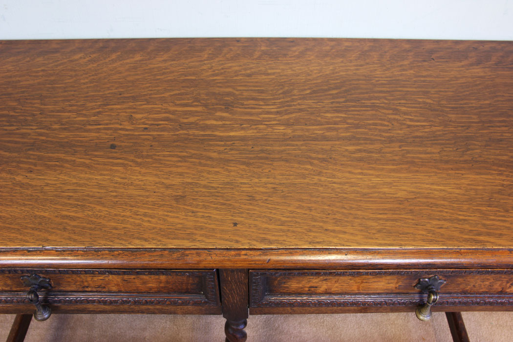 11376r6 Antique Oak Side Lamp Table, Antique Oak Barley Twist Two Drawer Side Table. This oak side table has a solid oak top with moulded edge under having two drawers
