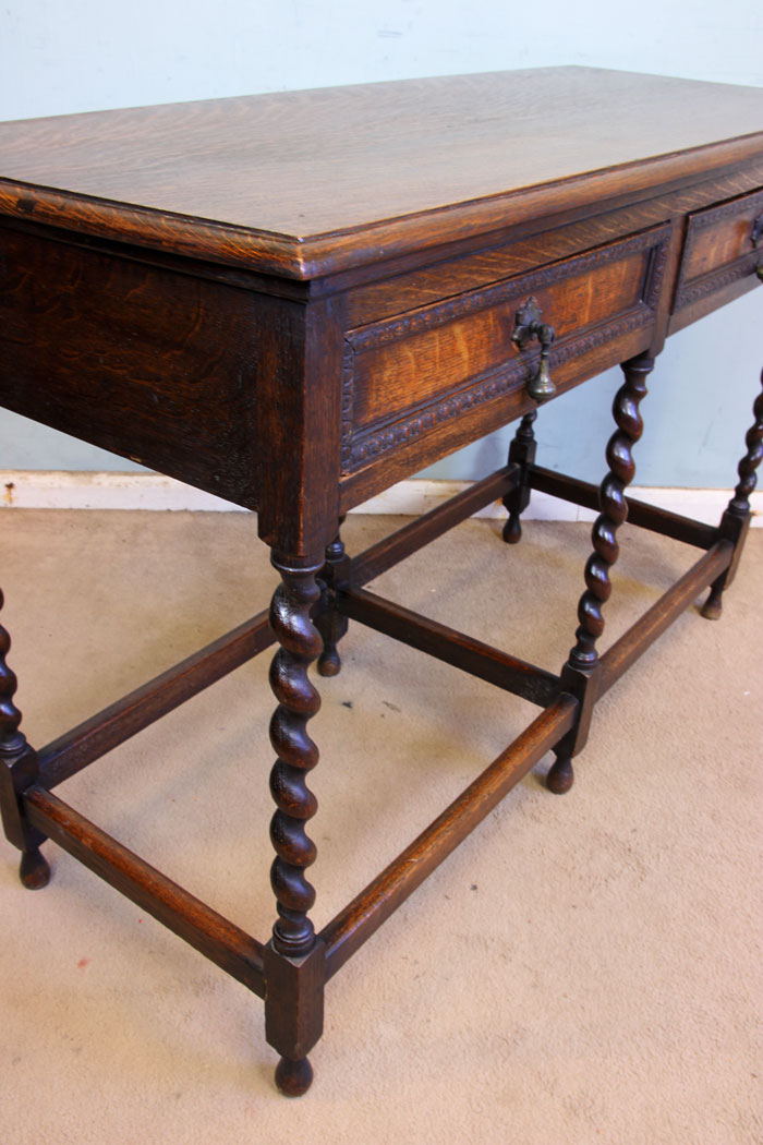 11376r8 Antique Oak Side Table, Antique Oak Barley Twist Two Drawer Side Table. This oak side table has a solid oak top with moulded edge under having two drawers