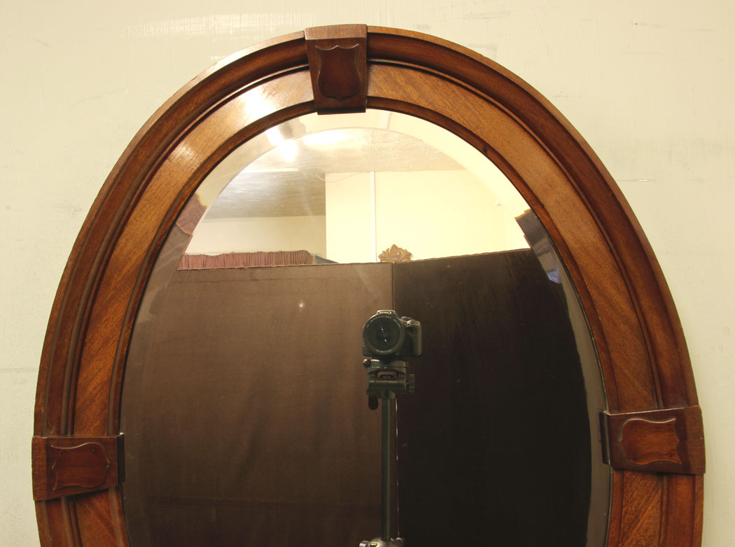 11380r4 Antique Mahogany Bevelled Oval Hall Mirror, Antique Mahogany Oval Overmantle Wall Mirror. This lovely quality mahogany framed oval mirror has a raised moulded edge