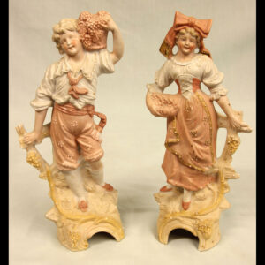 Pair of Bisque Figurines of Young Girl & Boy.
