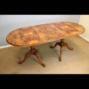 Twin Pedestal Burr walnut Extending Dining Table.