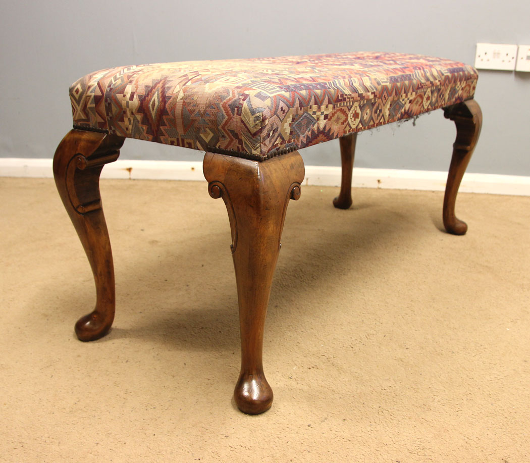 12389r2 Antique Walnut Long Duet Cabriol Leg Stool, Antique Walnut Long Duet Cabriole Leg Stool. This walnut antique duet / long / cabriole leg stool window seat has a upholstered padded seat supported cabriole style legs with scroll detail.